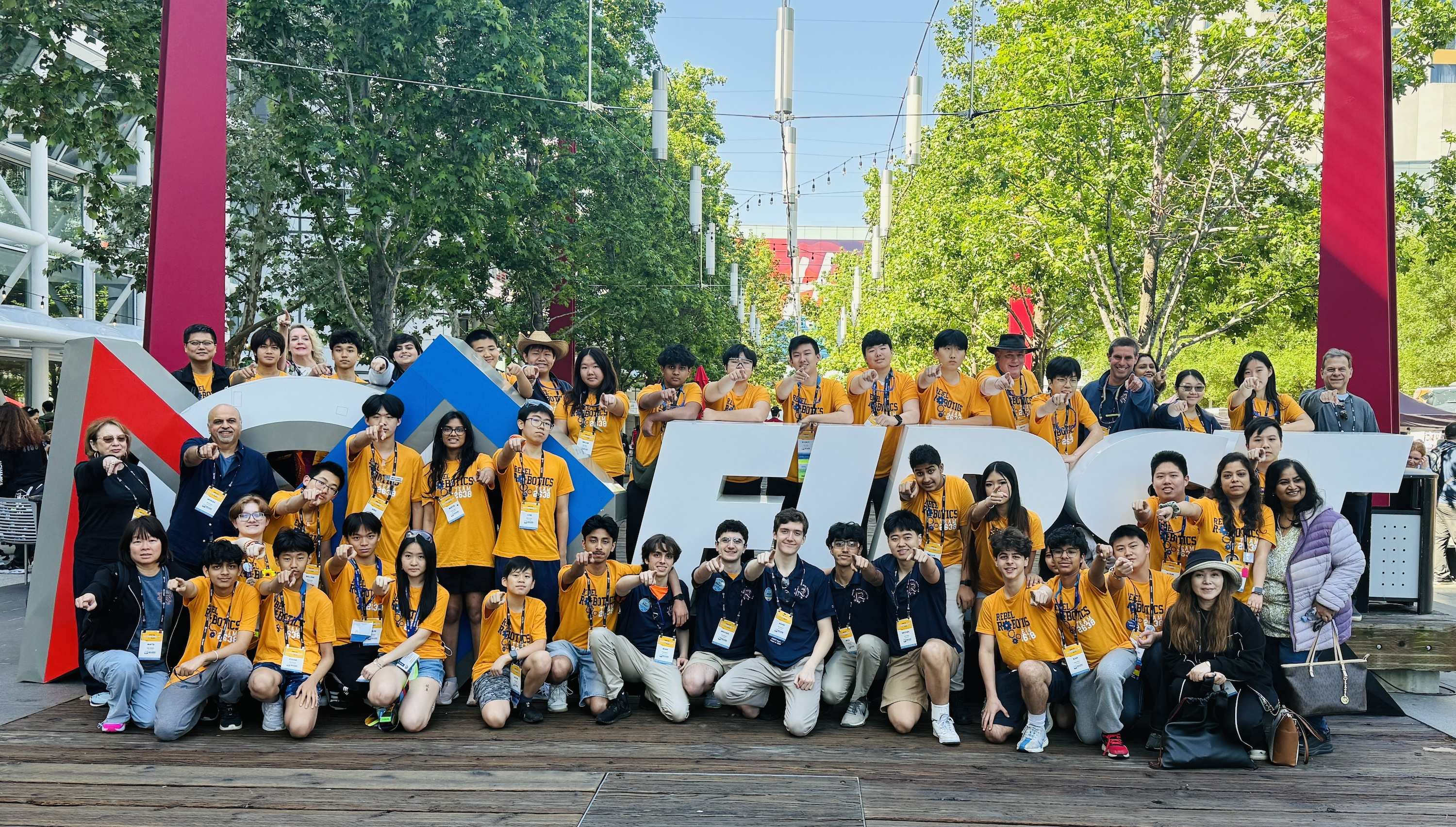 Team 2638 posing at the FIRST sign at the 2026 World Championship